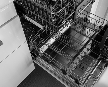 Picture of an open electric dishwashwer